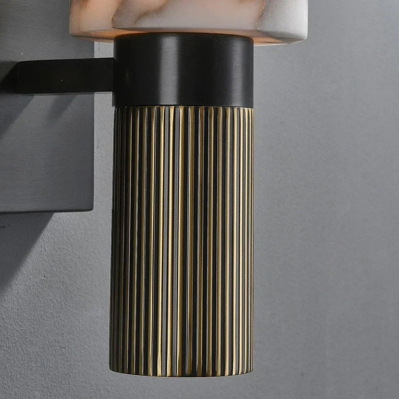 Modern wall lamp with an alabaster shade and brass details