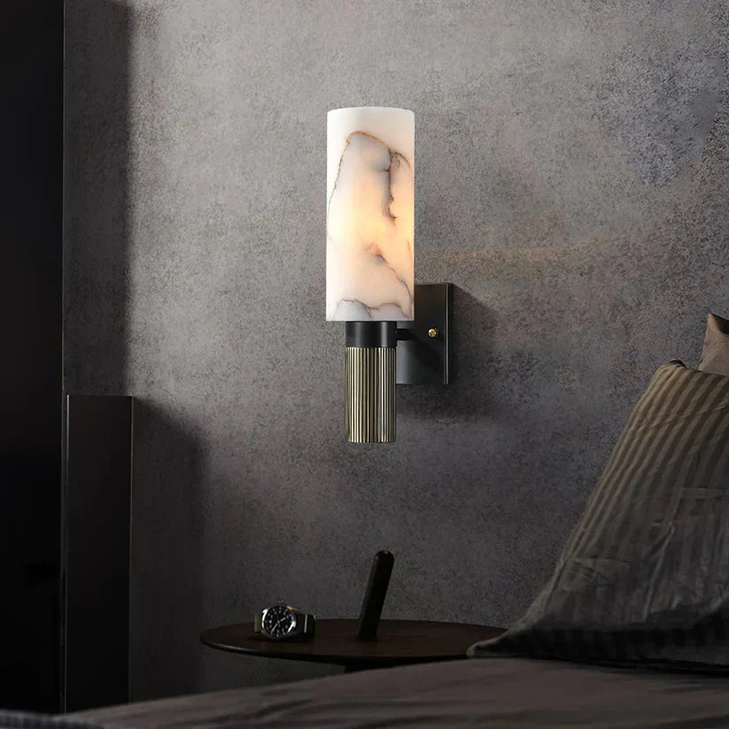 Modern wall lamp with an alabaster shade and brass details