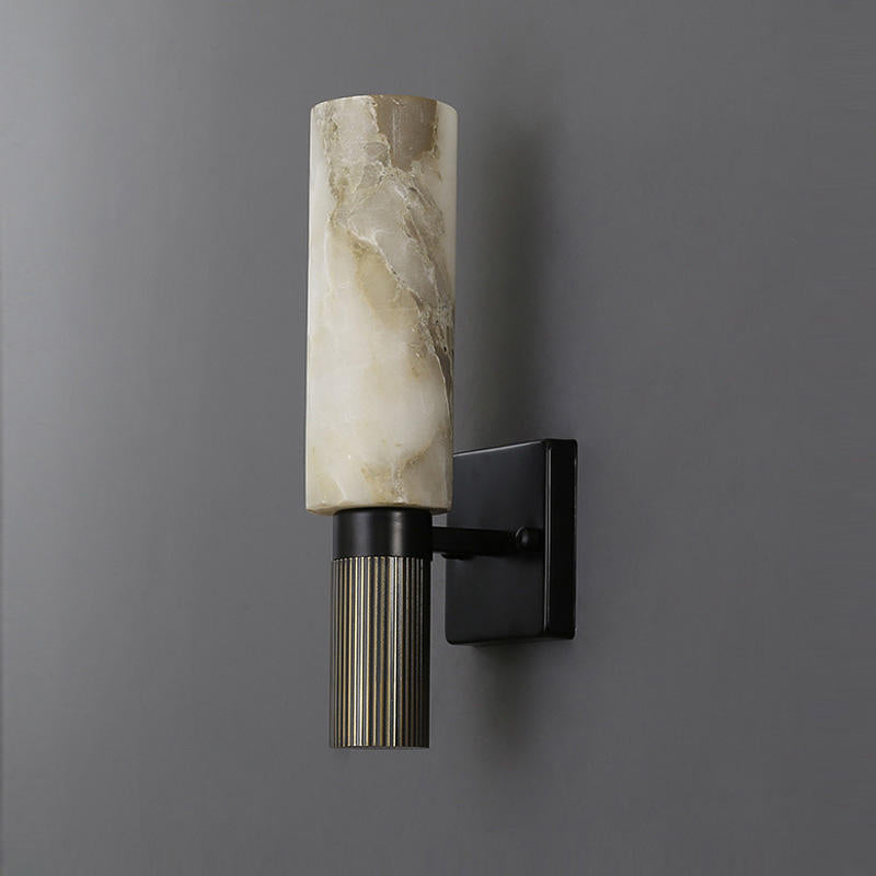 Modern wall lamp with an alabaster shade and brass details