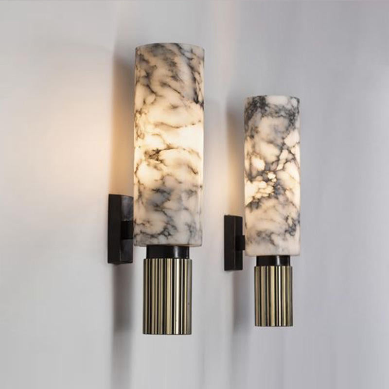 Modern wall lamp with an alabaster shade and brass details