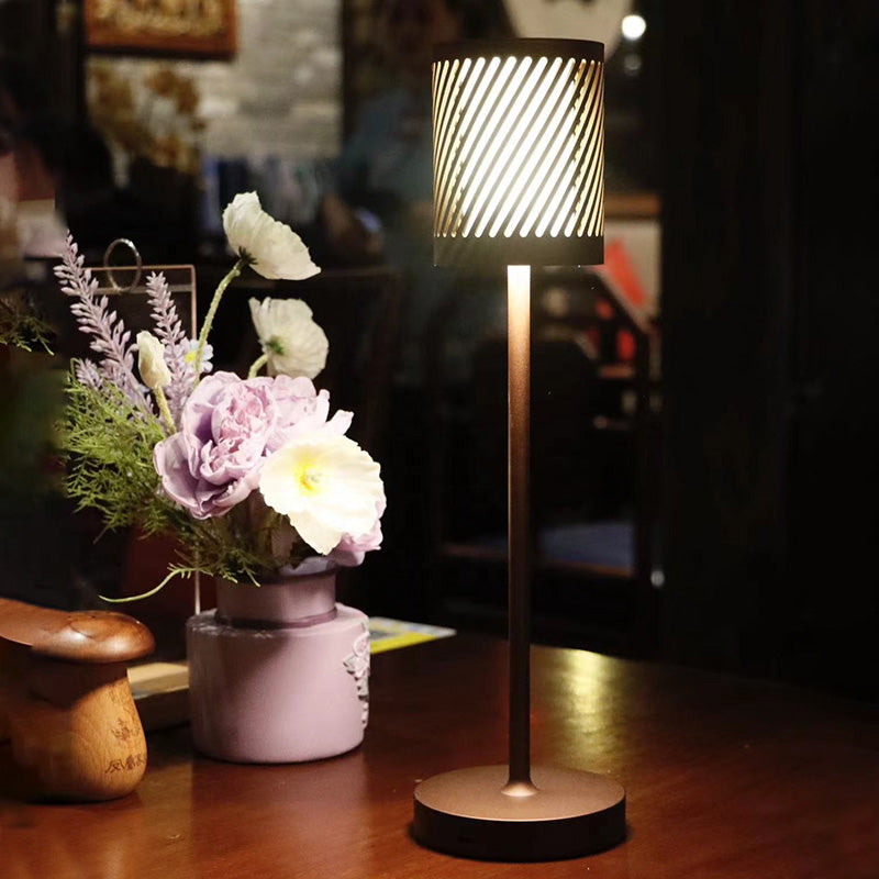 Modern LED table lamp – uniquely cut shade and warm glow