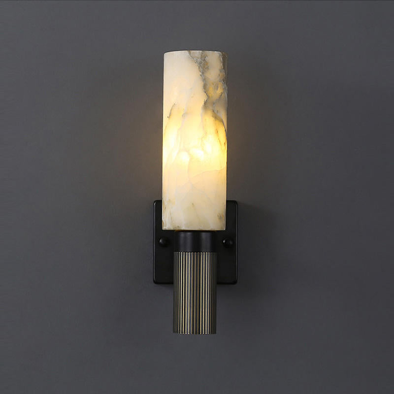 Modern wall lamp with an alabaster shade and brass details