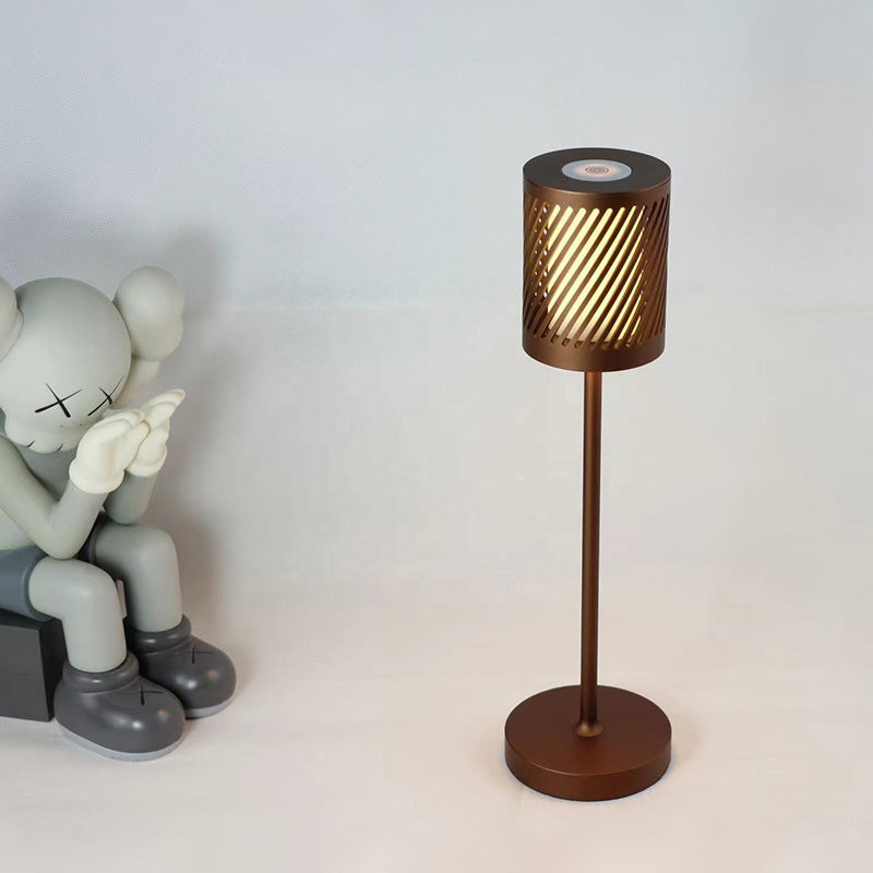 Modern LED table lamp – uniquely cut shade and warm glow